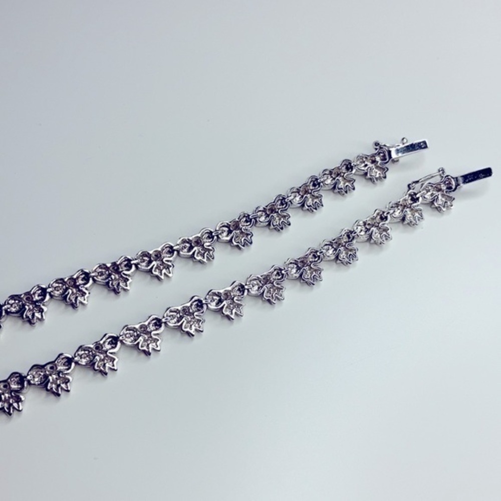 Sterling Silver String Of Bows Set Of 2 - image 2